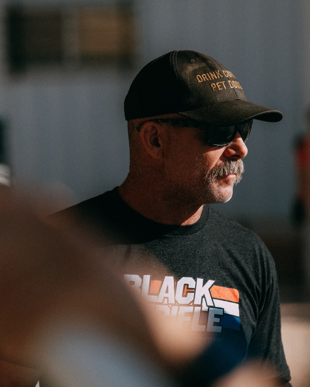 Erin S. on-site at Outer Heaven, Black Rifle Coffee tee